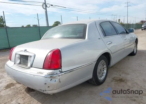 1999 Lincoln Town Car Cartier from USA, damaged, VIN 1LNHM83W3XY654925